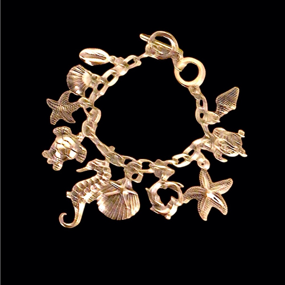 NIB...Womens' Silver Charm Bracelet.Size 7.5" -8"